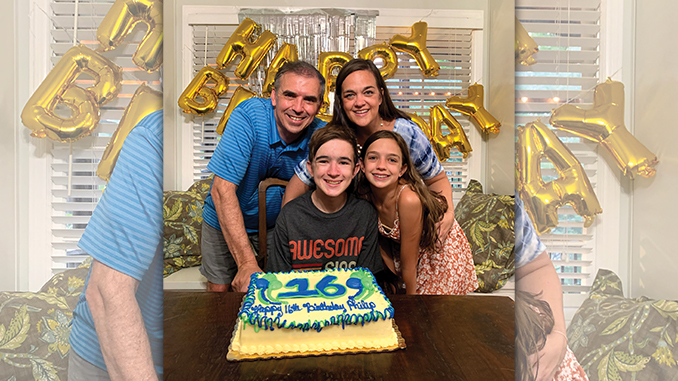 Phillip Moss and his family celebrate his sixteenth birthday.