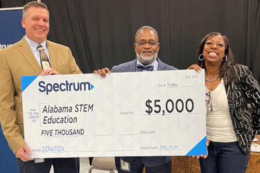 SPECTRUM Donates $5