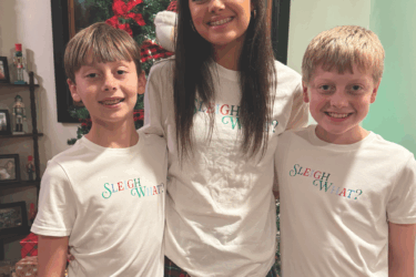 Amy's kids by the Christmas tree